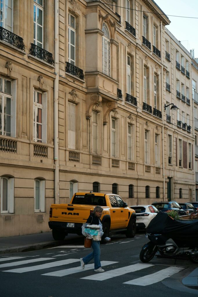 Urban Street Scene with Yellow Truck in Paris